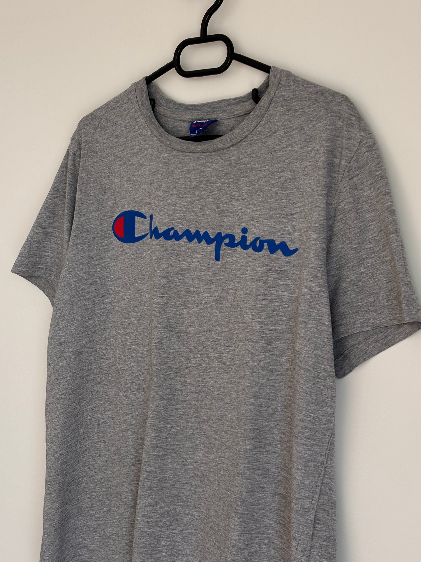 Champion Tee